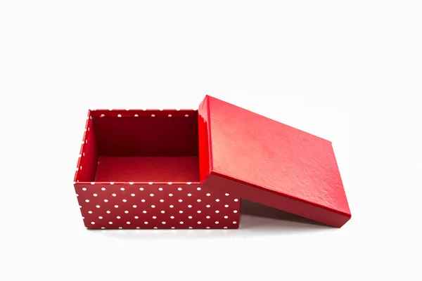 Red polka dots box on white background. — Stock Photo, Image