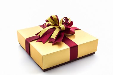 şerit yay ile altın ve kahverengi hediye kutusu.