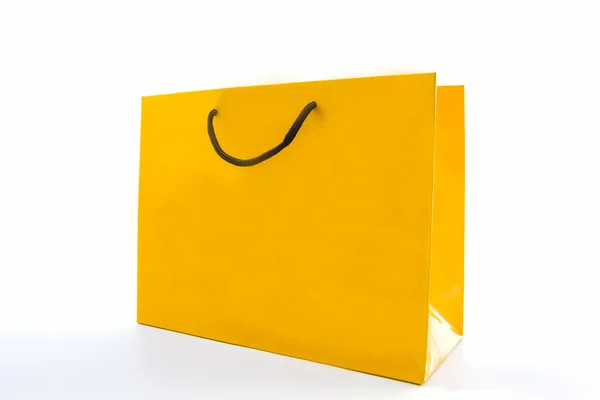 Blank yellow paper shopping bag. — Stock Photo, Image