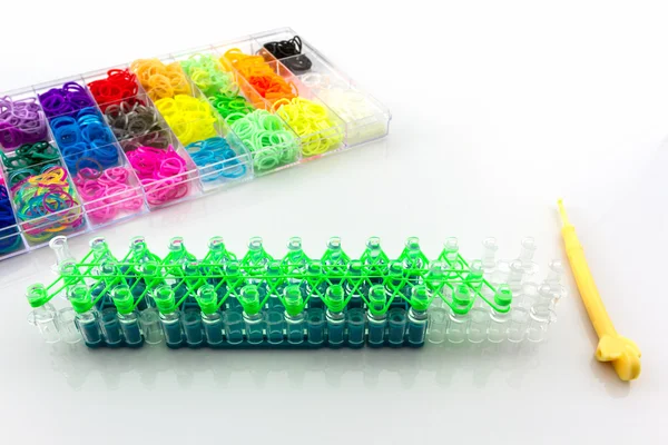 Kleurrijke van elastische regenboog weefgetouw bands tool. — Stockfoto