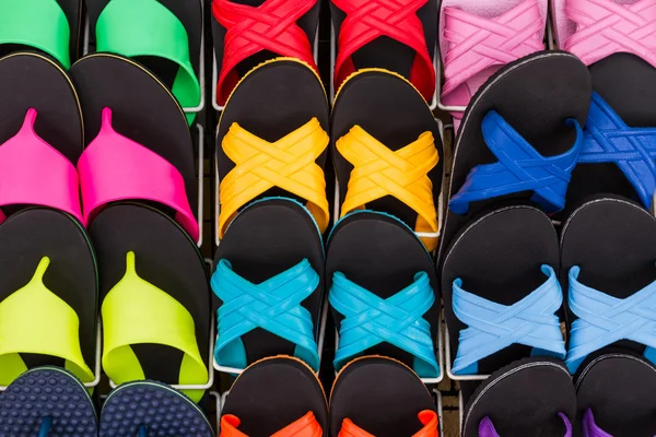 Colorful of flat shoes hanging on shelf for sale. — Stock Photo, Image