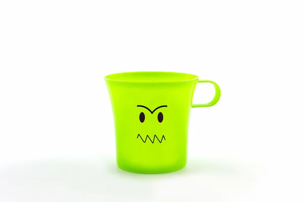 Kleurrijke van gelaatsuitdrukking op cup . — Stockfoto