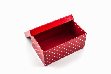 beyaz zemin üzerine kırmızı puantiyeli kutu.