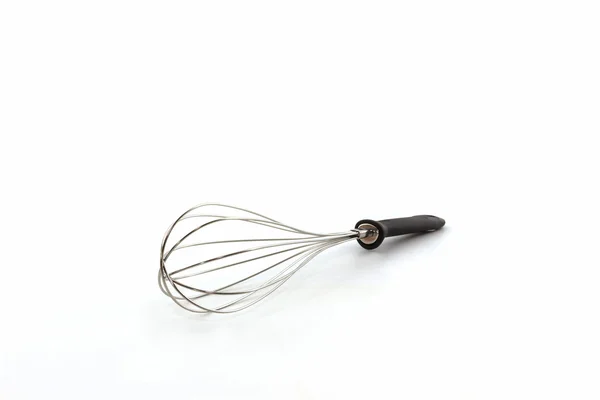 Metal whisk for whipping eggs, House ware. — Stock Photo, Image