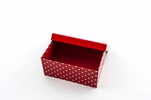 Caja de lunares roja sobre fondo blanco . —  Fotos de Stock