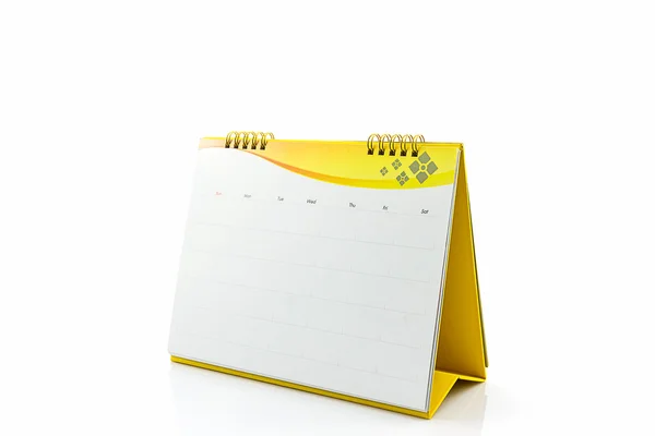 Giallo carta bianca scrivania calendario a spirale . — Foto Stock