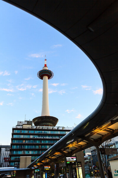 Kyoto tower with dark sky in Japan.