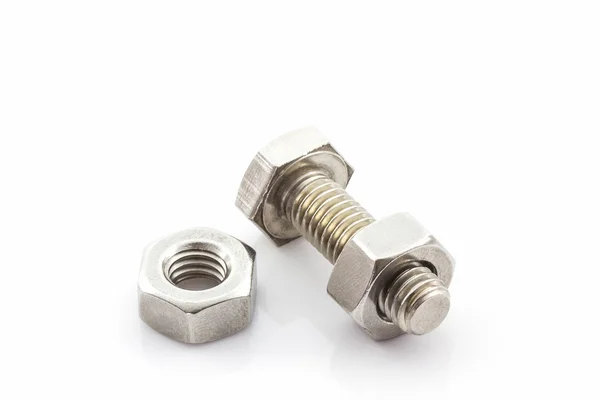 Metal screw and nuts on white background. — Stock Photo, Image