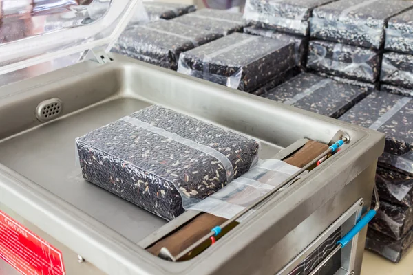 Rice jasmine berry rice in small plastic bag . — Stock Photo, Image