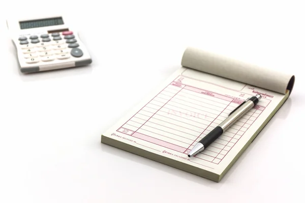 Invoice book which open blank page with pen and calculator. — Stock Photo, Image