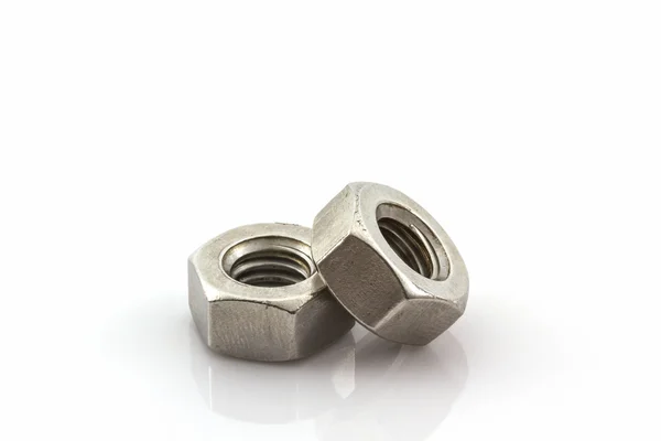 Metal nuts on white background. — Stock Photo, Image