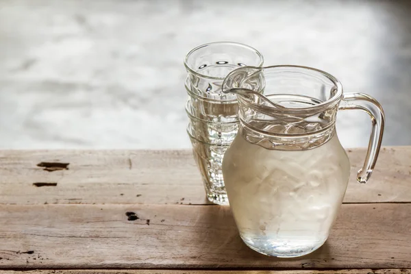 Glass pitcher of water and glass. — Stock Photo, Image