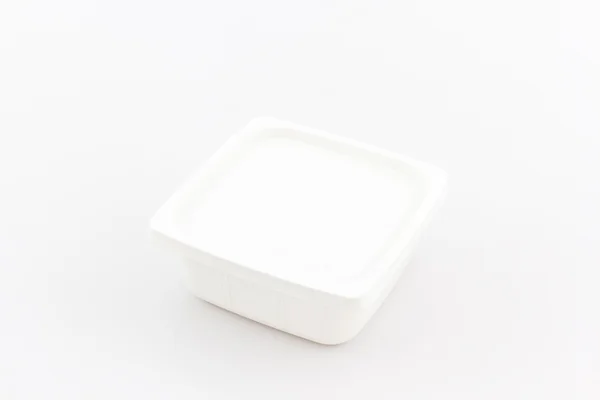 Caja de comida de plástico blanco sobre fondo blanco . — Foto de Stock