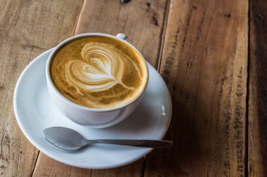 cappuccino veya ahşap masa kahve latte.