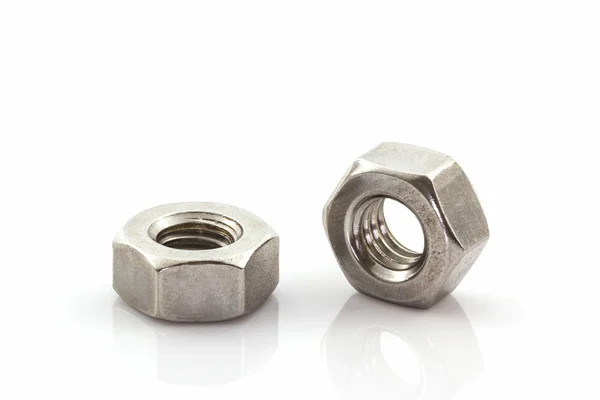 Metal nuts on white background. — Stock Photo, Image