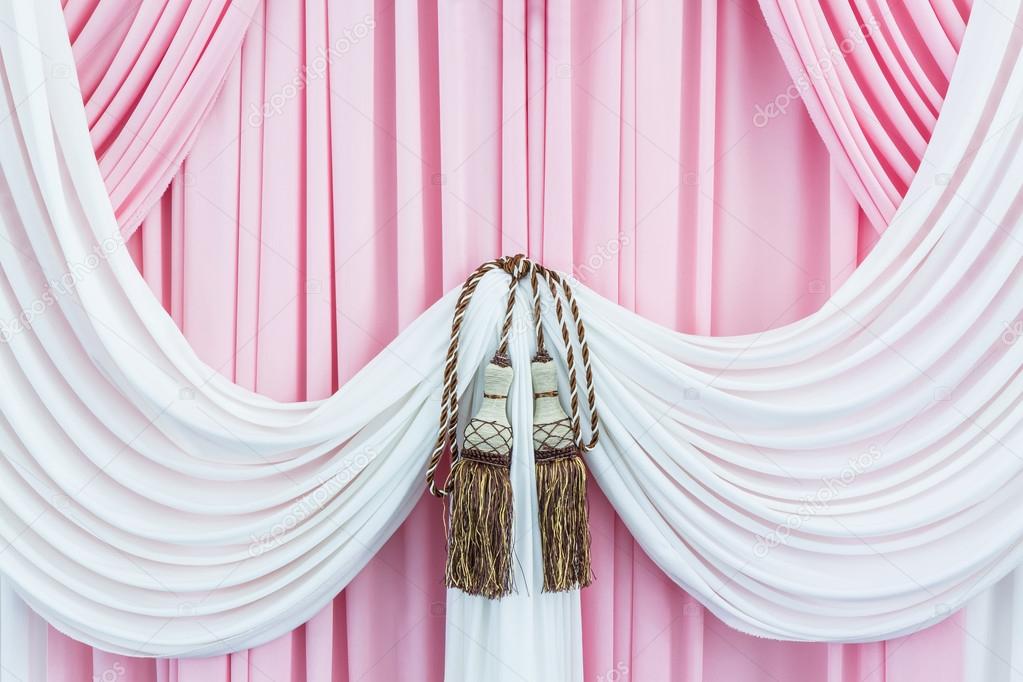 Beautiful sweet curtains with tassels.