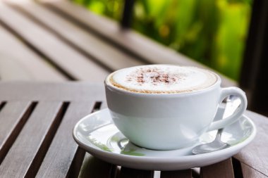 cappuccino veya ahşap masa kahve latte.