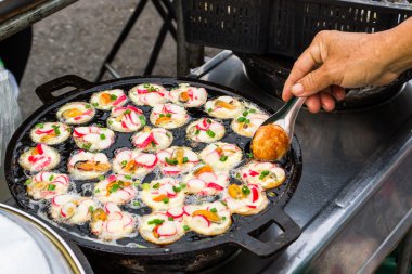 Colorful of seafood fried with shrimps, shellfish on thai ancien