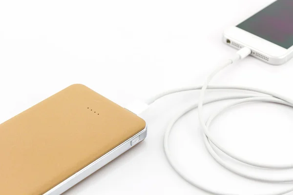 Yellow power bank USB cable for smartphone . — ストック写真