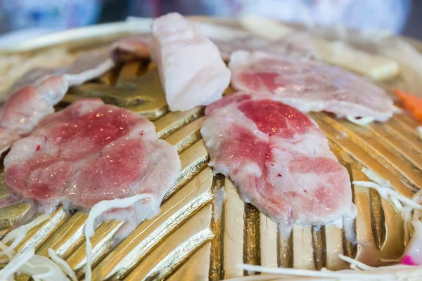 Fresh pork slices on oven. — Stock Photo, Image