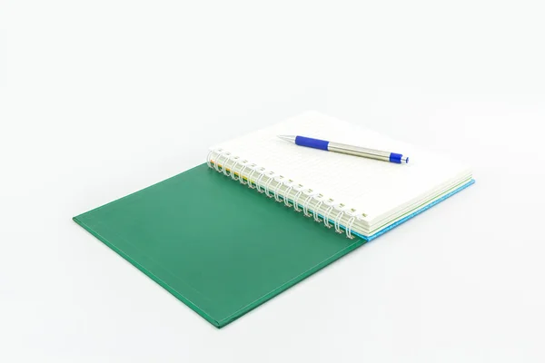 ペンと緑の本. — ストック写真