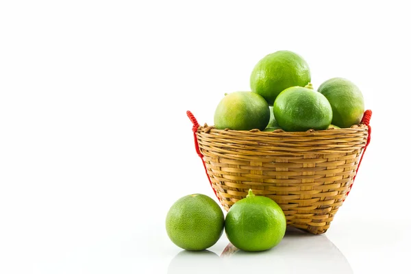 Limes in basket. — Stock Photo, Image