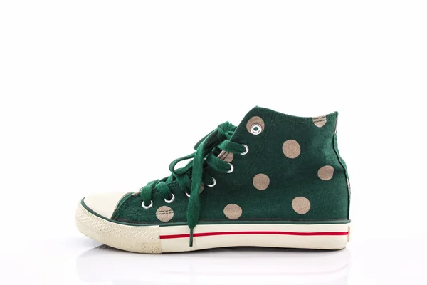 녹색 폴카 도트 캔버스 신발. — 스톡 사진