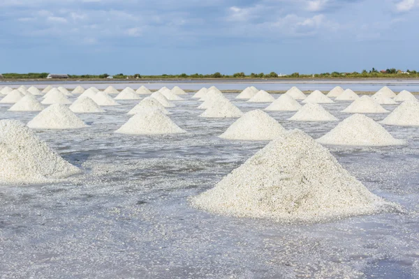 Heap of sea salt in salt farm ready for harvest. — Stock Photo, Image