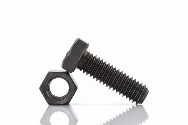 Closeup metal screw, bolt and metal nuts. — Stock Photo, Image