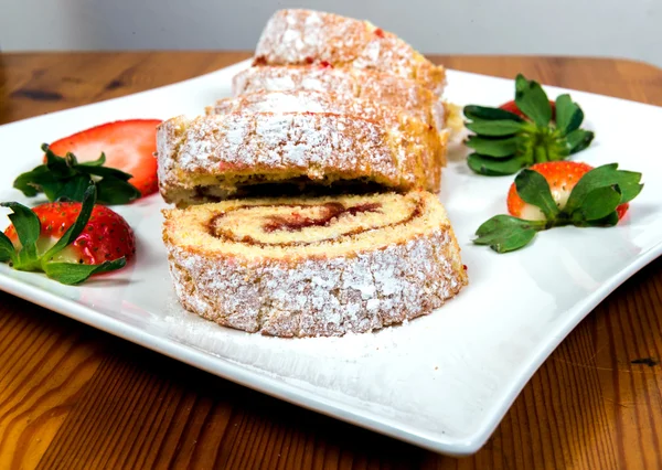 Swiss roll with strawberry jam — Stock Photo, Image