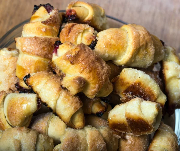 Croissants with strawberry jam — Stock Photo, Image