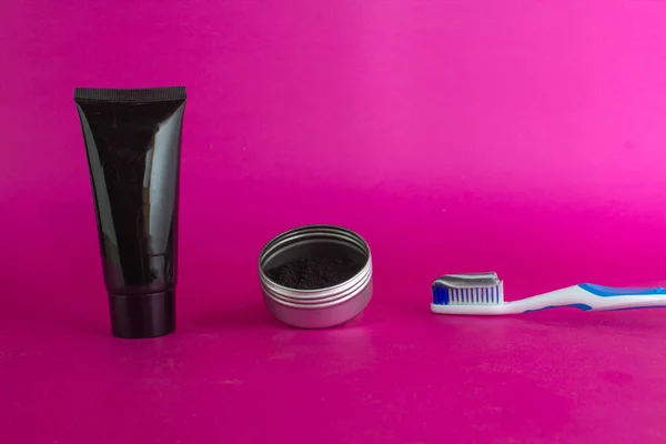 Activated Charcoal Container Next Toothbrush Toothpaste Face Mask Personal Care — Stock Photo, Image