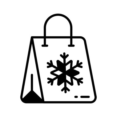 Beyaz kar tanesi tasarımıyla süslenmiş bayram alışveriş çantası.