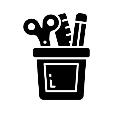 Okul malzemelerini ve yaratıcı yazıları sembolize eden kırtasiyeli bir fincan.