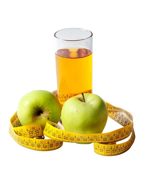 Apple juice and measuring tape — Stock Photo, Image