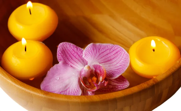 Floating candles and orchide flower — Stock Photo, Image