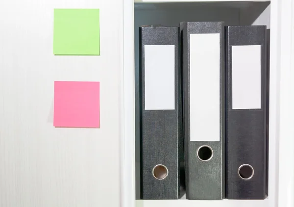 Folders for documents on a book shelf — Stock Photo, Image