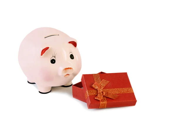 Piggy bank  and gift box isolated on a white background. — Stock Photo, Image