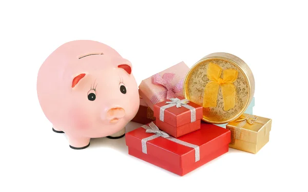 Piggy bank  and gift boxes isolated on a white background. — Stock Photo, Image