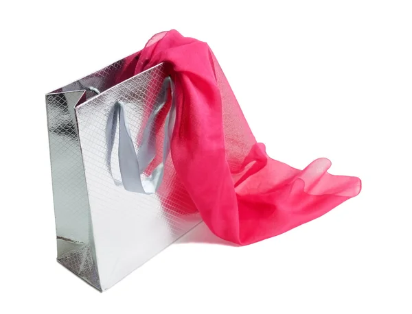 Bolsa de regalo de plata y bufanda de seda rosa aislada en blanco —  Fotos de Stock