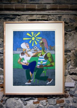 Menton, 19/01/2014. Artworks in The Bastion Museum by Jean Cocteau.  Fisherman and young girl drinking. Color lithograph on Rives vellum