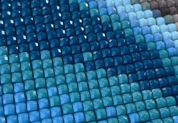 Yakından, rengarenk kare elmas işlemeli parlak. Hobiler ve eğlence.