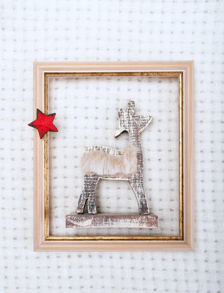 Christmas reindeer framed picture with  fur and red star — Stock Photo, Image