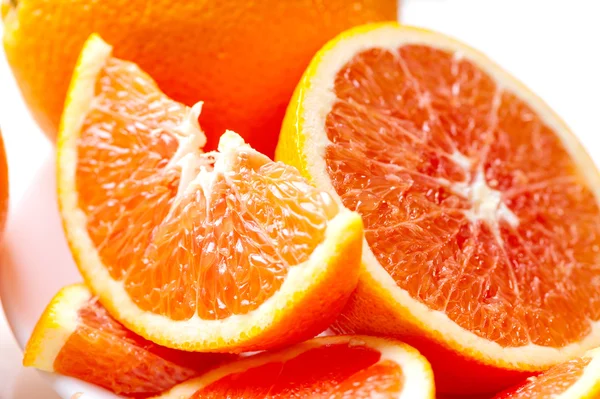 Zbliżenie: soczyste plasterki czerwonych pomarańczy — Zdjęcie stockowe