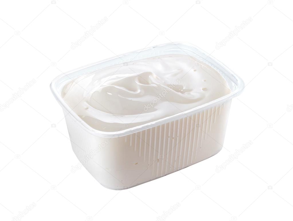 plastic container with sour cream isolated