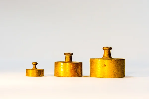 Collection of Small Golden Calibration Weights — Stock Photo, Image