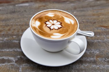 art latte coffee on white cup clipart