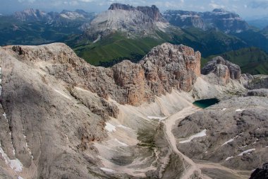 View  from Catinaccio d`Antermoia summit, the highest mountain of Catinaccio group, Dolomites, Trentino, South Tyrol, Italy, Antermoia Lake. Dramatic mountain landscape clipart