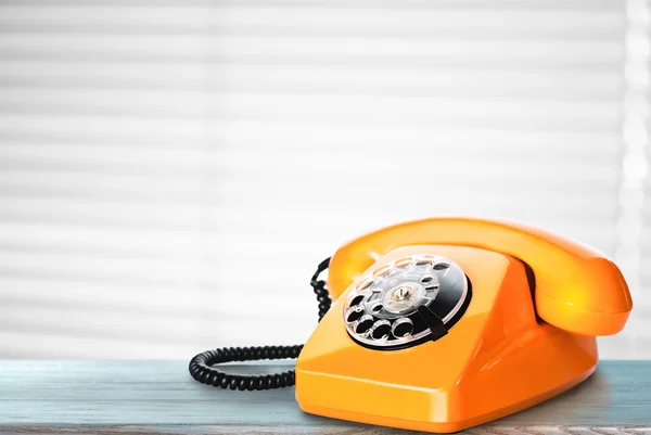 Vintage phone on table — Stock Photo, Image