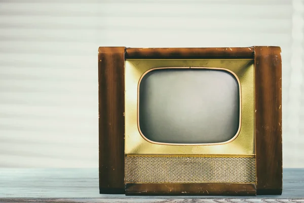 Vintage TV on table — Stock Photo, Image